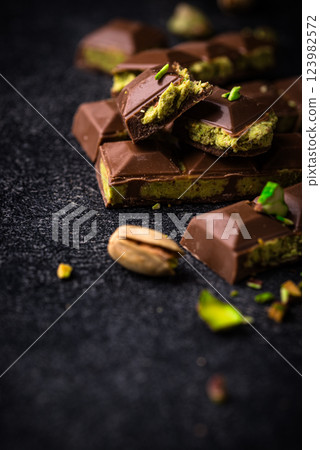 Dubai chocolate with kadayif pistachio filling Dubai chocolate with kadayif pistachio filling 123982572