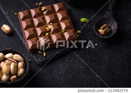 Dubai chocolate with kadayif pistachio filling 123982574