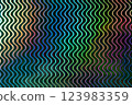 A mesmerizing pattern of wavy lines in vibrant colors, creating a ripple effect that captures the eye with its dynamic energy and fluidity. 123983359