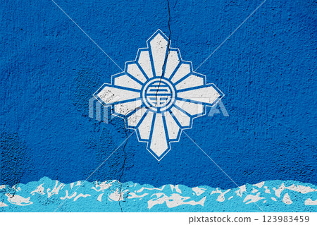 Official flag of Toyama. City in Japan. Conceptual collage against the background of a cracked wall Official flag of Toyama. City in Japan. Conceptual collage against the background of a cracked wall 123983459
