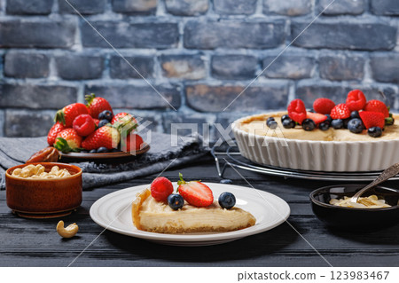 Berry tart with marzipan crust and vegan filling 123983467