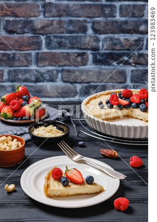 Berry tart with marzipan crust and vegan filling 123983469