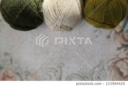 Top view on vintage desk with yarn 123984420