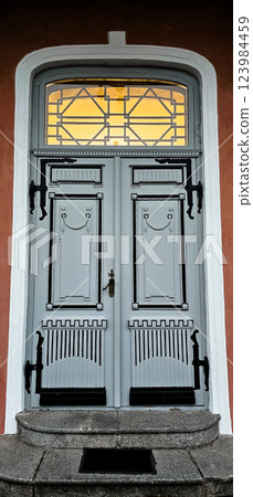 Beautiful vintage grey door with light 123984459