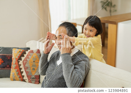 Grandfather and grandchildren playing Grandfather and grandchildren playing 123984891