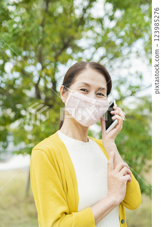 Senior woman wearing a mask Senior woman wearing a mask 123985276