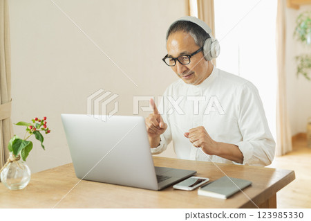 Senior man working remotely Senior man working remotely 123985330