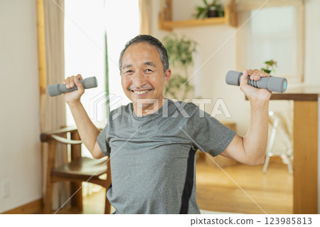 Senior male exercising Senior male exercising 123985813
