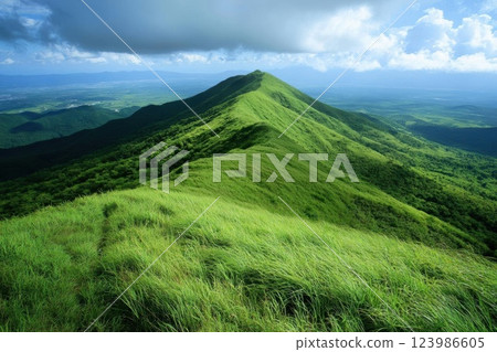 Green Mountain Ridge Overlooks Lush Valley with Scenic Landscape and Nature's Beauty Green Mountain Ridge Overlooks Lush Valley with Scenic Landscape and Nature's Beauty 123986605