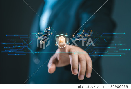 Cybersecurity and privacy concepts to protect data. Business Finger press on the fingerprint icon and internet network security technology. Virtual screen interfaces. cyber security. 123986989
