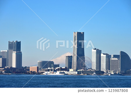 Mount Fuji floating in the sea and Yokohama Minato Mirai Mount Fuji floating in the sea and Yokohama Minato Mirai 123987808