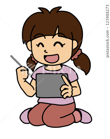 A girl operating a tablet with a smile on her face Color A girl operating a tablet with a smile on her face Color 123988273