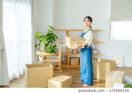 Young woman preparing to move 123988289