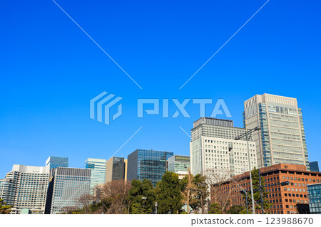 Cityscape of an office district looking up at skyscrapers from below Business image Cityscape of an office district looking up at skyscrapers from below Business image 123988670