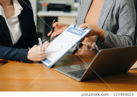 Consultation between a male lawyer and business customer, handshake after good deal agreement, Law and Legal 123989023