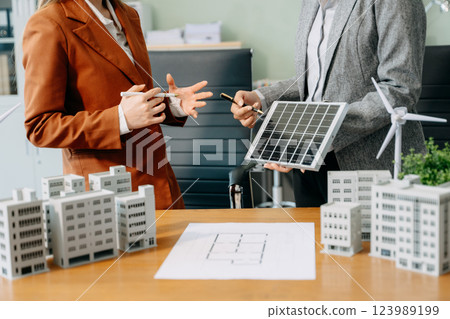 Business team people planning hand using laptop for working technology and business Net zero and carbon neutral 123989199