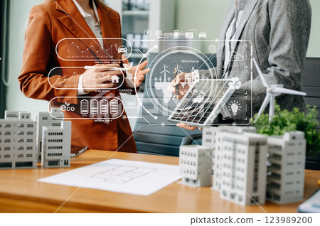 Business team people planning hand using laptop for working technology and business Net zero and carbon neutral 123989200
