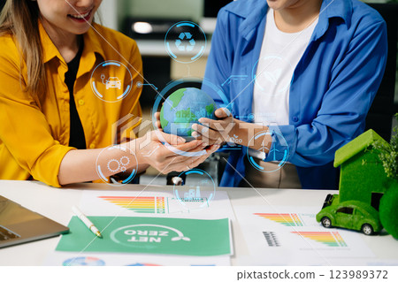 business team people planning and discussing on recycle reduce reuse policy symbol in office meeting room. 123989372