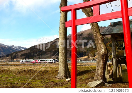 A view of the original Japanese landscape, Tono City, with a view of the shrine and the railway near Ayaori 123989973