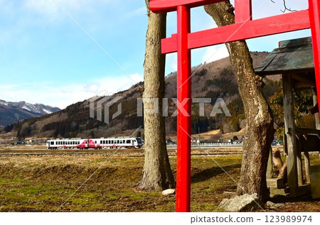 A view of the original Japanese landscape, Tono City, with a view of the shrine and the railway near Ayaori 123989974