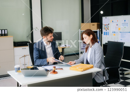 Modern lawyer office a professional discussion, legal documents, and teamwork. Perfect 123990051