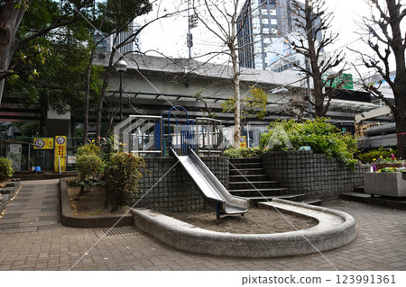 Slide in a small park in a big city 01 Slide in a small park in a big city 01 123991361