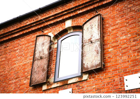 Brick wall and window Brick wall and window 123992251