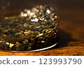 Tadpoles in a glass container 123993790