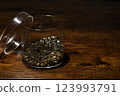 Tadpoles in a glass container 123993791