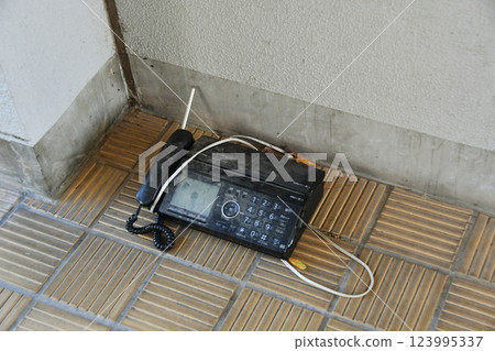 Illegally dumped telephones and faxes 123995337