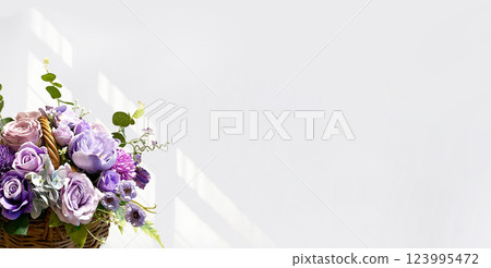 Flower arrangement placed by the window in the living room 123995472