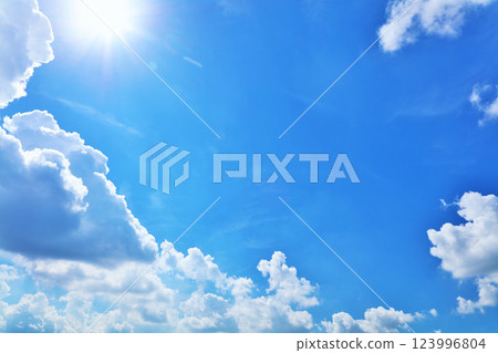 Summer blue sky, clouds and sun 123996804