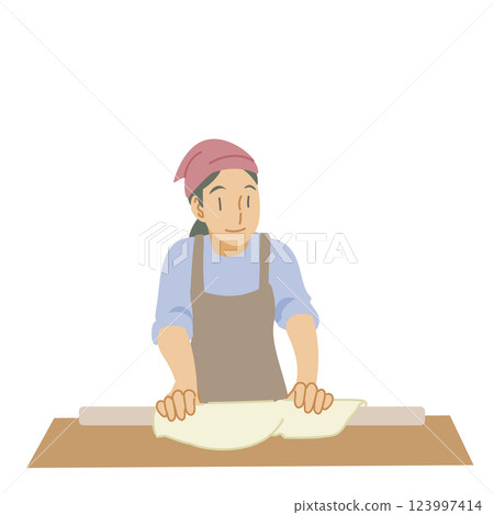 一名婦女用擀麵棍擀蕎麥麵團 一名婦女用擀麵棍擀蕎麥麵團 123997414