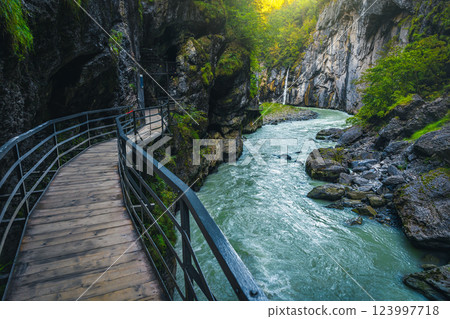 Winding narrow footbridge in the Aare gorge, Meiringen, Switzerland Winding narrow footbridge in the Aare gorge, Meiringen, Switzerland 123997718