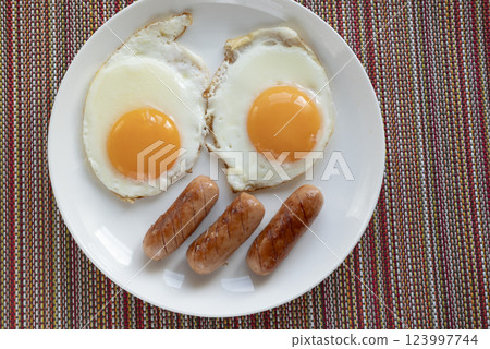 Fried eggs for breakfast 123997744