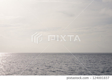 Empty ocean background with calm water Empty ocean background with calm water 124001837