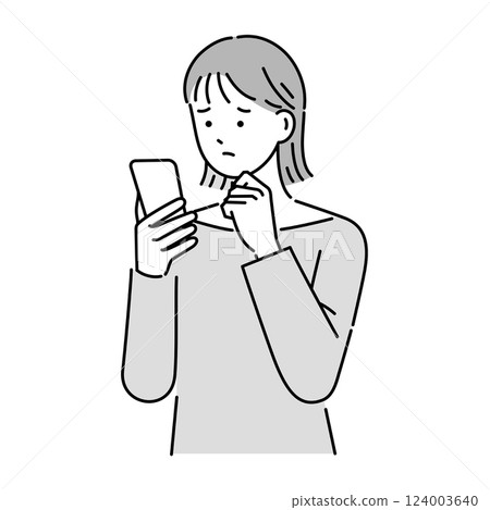 A woman with a troubled face operating a smartphone A woman with a troubled face operating a smartphone 124003640