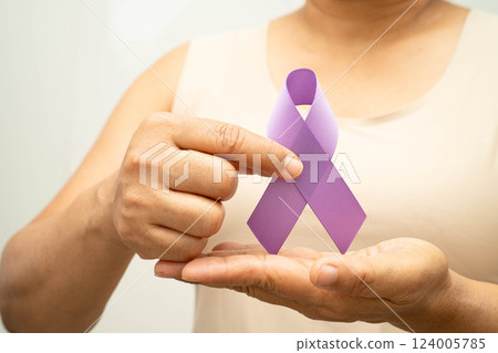 Asian woman with purple ribbon for September World pancreatic cancer day or world Alzheimer day. Asian woman with purple ribbon for September World pancreatic cancer day or world Alzheimer day. 124005785