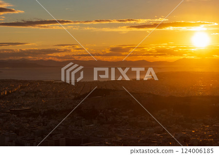 A breathtaking view of the sunset over the city of Athens, Greece from the top of the Lycabettus hill 124006185