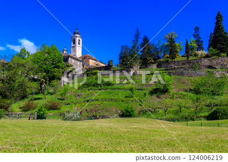 Sanctuary of the Crucifix on the Sacred Mount Calvary of Domodossola, a UNESCO World Heritage site, is one of most important religious and historical sites in Piedmont, Italy 124006219