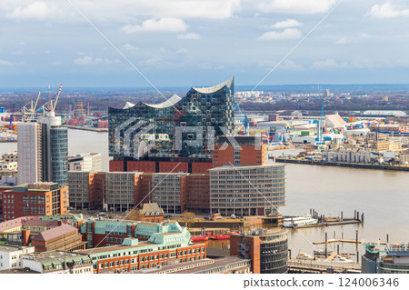 Aerial view of the Harbor District, Elbphilharmonie and downtown in Hamburg, Germany. View from bell tower of St. Michael's Church Aerial view of the Harbor District, Elbphilharmonie and downtown in Hamburg, Germany. View from bell tower of St. Michael's Church 124006346