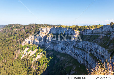 View of Creux Du Van, the amphitheater shaped rock formation, which is 1400 metres wide and 150 metres deep, in Neuchatel canton, Switzerland 124006380