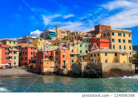 Picturesque view of beach, blue sea and colorful buildings of Boccadasse, old fishing village, in Genoa, Italy 124006386