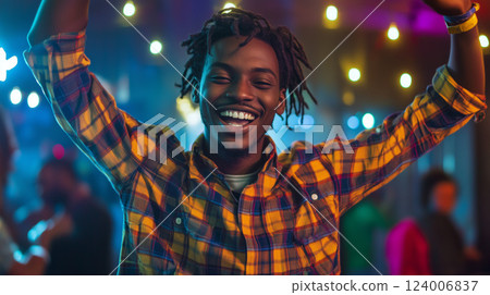 Cheerful college students enjoying a vibrant night out, dancing and laughing together at a lively nightclub filled with energy 124006837