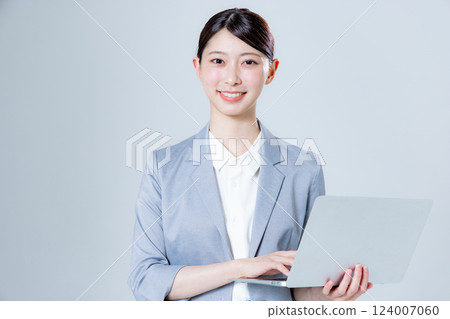 Business woman with laptop Business woman with laptop 124007060
