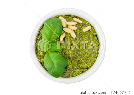 Pesto sauce in ceramic bowl isolated on white background. Top view. Flat lay. Pesto sauce in ceramic bowl isolated on white background. Top view. Flat lay. 124007765