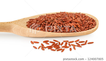 red rice in a wooden spoon isolated on white background 124007805