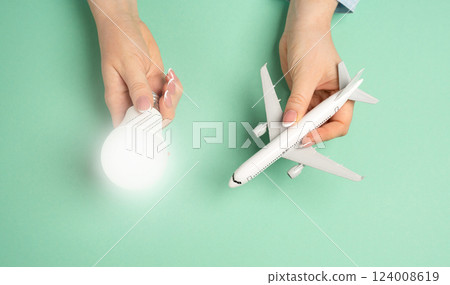 Light bulb idea and airline passenger plane. Innovative ideas in aviation. Efficient flight planning, business strategies in the travel industry. New travel solutions, airline improvements. Light bulb idea and airline passenger plane. Innovative ideas in aviation. Efficient flight planning, business strategies in the travel industry. New travel solutions, airline improvements. 124008619
