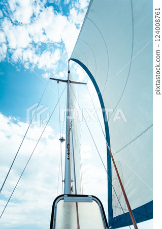 Detailed closeup of sail on sailboat Detailed closeup of sail on sailboat 124008761
