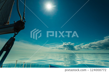 Yachting on sail boat during sunny weather 124008772